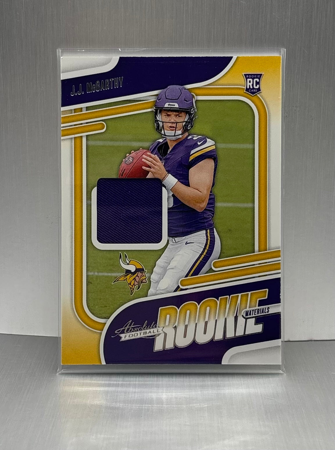 2024 Panini Absolute Rookie Materials # ARM-JMY J.J. McCarthy Rookie Card