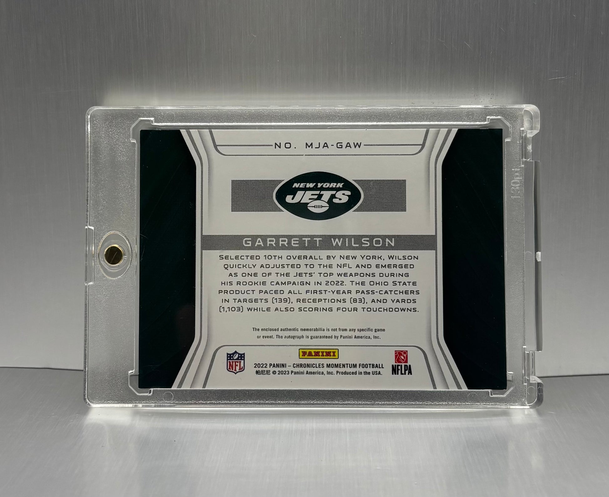 2022 Panini Chronicles Momentum Garrett Wilson Triple patch Auto Rookie Card /99