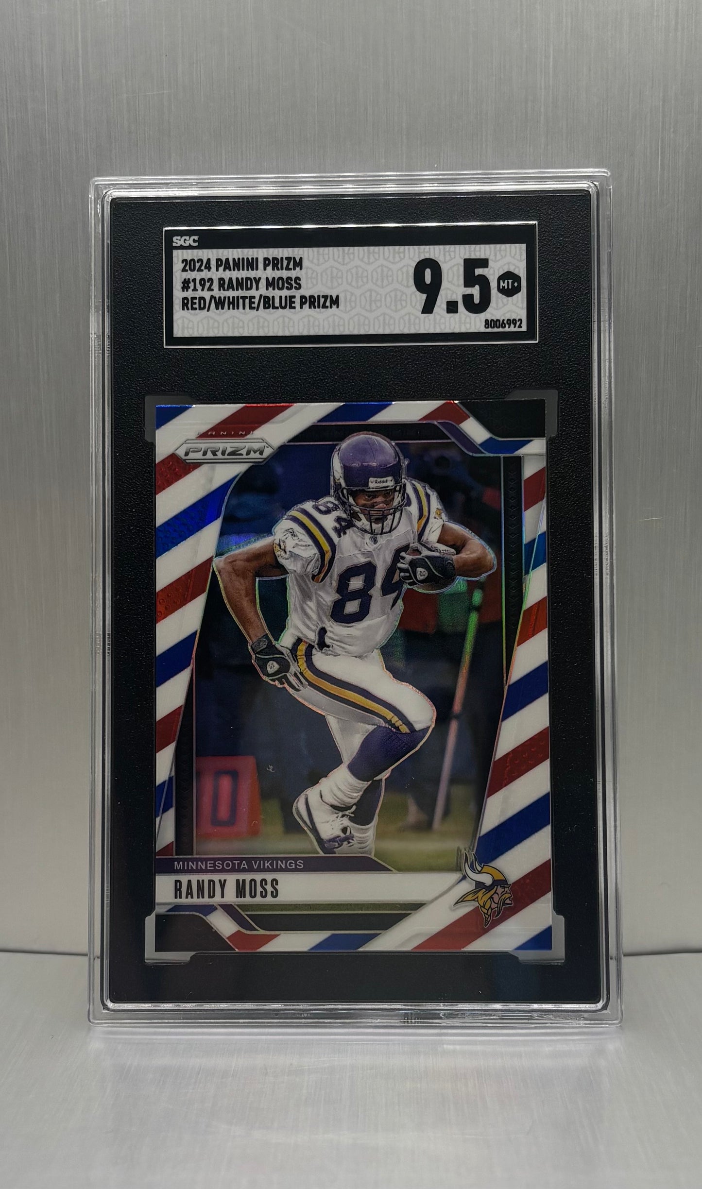 2024 Panini Prizm #192 Randy Moss Red/White/Blue Prizm SGC 9.5