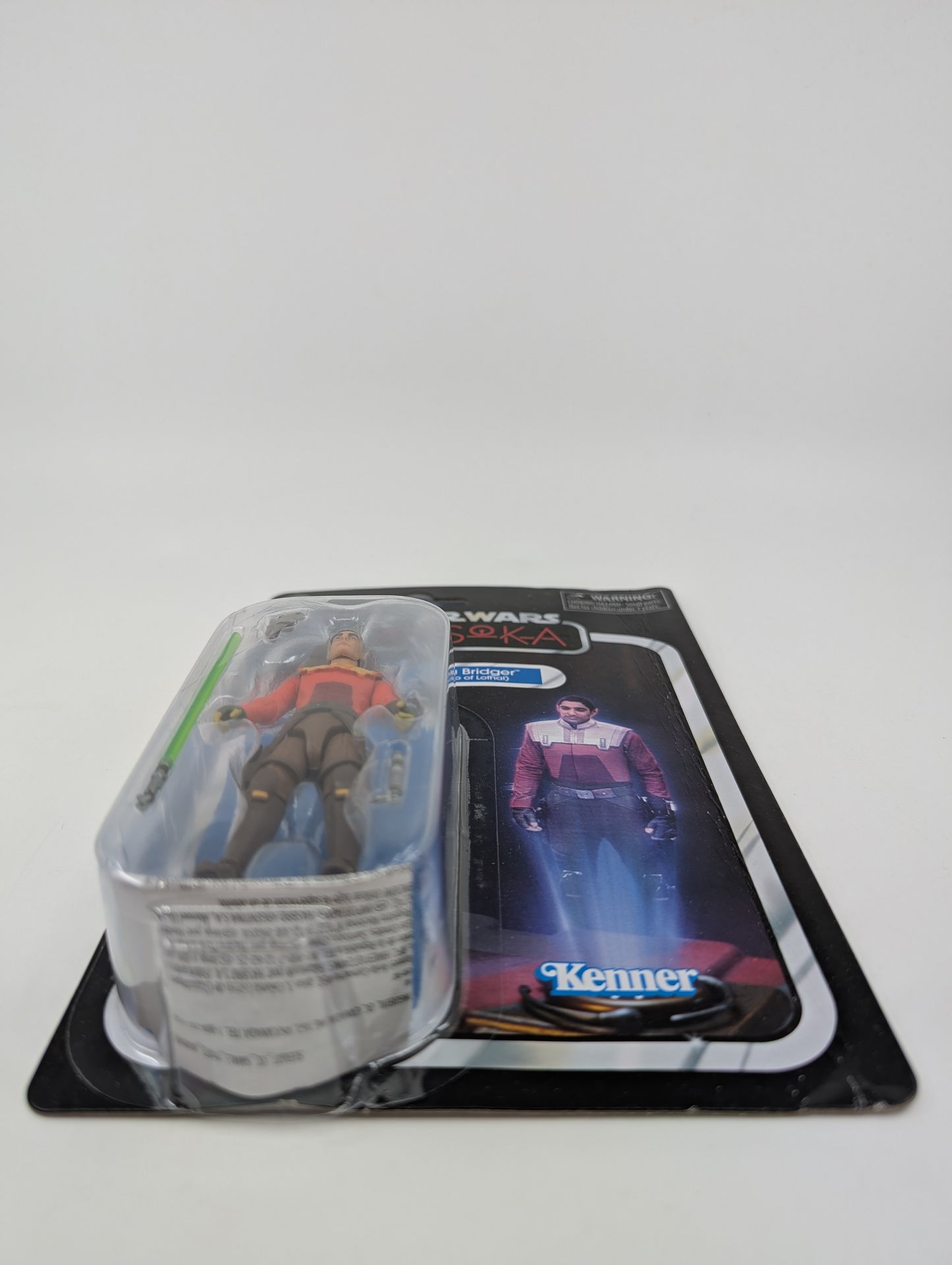 Claude responded: Title:  Title: 2024 - Star Wars Ahsoka - Ezra Bridger Hero of Lothal VC319 - Kenner